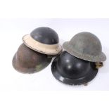 Group of four Second World War British Military MKII Steel Helmets to include Home Front Ambulance