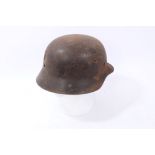 Second World War Nazi M40 Pattern Waffen SS Helmet with Battle Damage, in relic condition