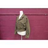 1949 Pattern Captain’s Battledress Blouse dated 1951, with Special Air Service shoulder titles,
