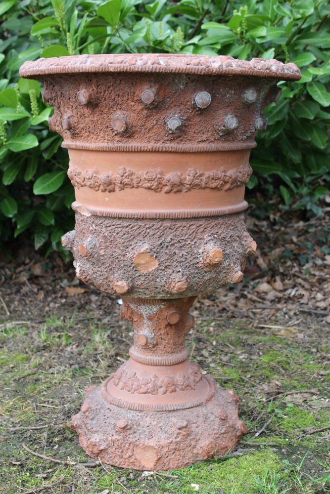 Large Antique terracotta garden urn with bark finish and foliate borders, 75cm high