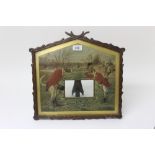 Edwardian oak framed Hunting Meets easel frame with an amusing inset print after Chavell, 37cm x