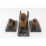 Egyptian Revival bronze garniture of three sphinxes