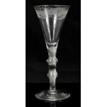 18th century wine glass with vine engraved trumpet bowl