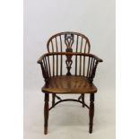 Early 19th century yew and elm stick back elbow chair