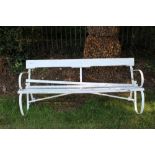 Antique white painted garden bench, slat back and seat on scrolled wrought iron frame, 180cm wide