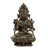 Bronze deity figure seated