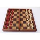 Early 20th century travelling chess set in mahogany case