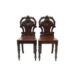 Pair of early Victorian mahogany hall chairs