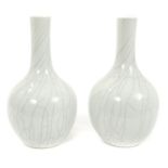 Pair Chinese Qing crackle glazed blanc-de-chine bottle vases