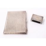 1920s silver cigarette case of rectangular form and a 1930s silver matchbox holder