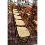 Set of eight oak ladderback chairs