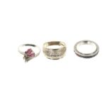 Ruby and sapphire eternity ring together with two 14ct gem set rings