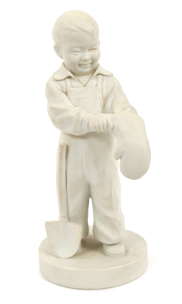Chinese Communist blanc-de-chine figure of a boy