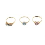 Three gold (9ct) gem set dress rings