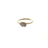 1930s diamond crossover ring in 18ct gold and platinum setting. Ring size O