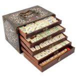 Antique Chinese teak and mother of pearl inlaid cased mahjong set