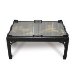 Good quality Chinese black lacquered coffee table with pierced gallery and gilt Chinese landscape