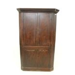 Late Regency grained pine standing corner cupboard