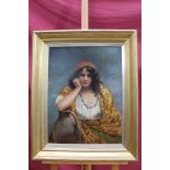 Late 19th/early 20th century Continental school oil over printed board - portrait of a gypsy girl,