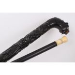 Early 19th century ebony walking stick and Anglo-Indian carved ebony walking stick
