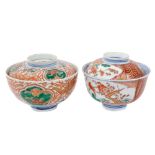 Two late 19th century Japanese Imari rice bowls and covers
