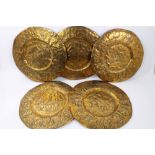 Five 19th Century Indian circular brass temple plates