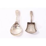 George III silver caddy spoon in the form of a shovel and a contemporary caddy spoon
