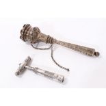 Georgian silver corkscrew and a 19th century white metal posy holder