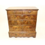 Early 18th century walnut crossbanded chest on stand, with moulded top and two short over three