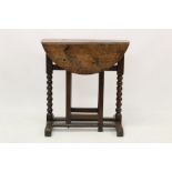 Rare 17th century oak drop leaf table