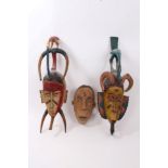 Three tribal masks, Sudan and others