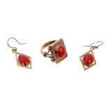 Gold (9ct) coral dress ring and a pair of gold (9ct) coral pendant earrings