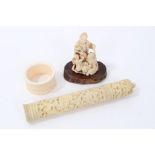 Japanese ivory netsuke group, Cantonese ivory needle case and ivory napkin ring (3)