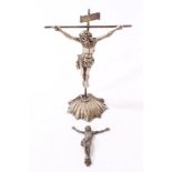 Spanish silver free-standing figure depicting the crucifixion and small white metal figure of Jesus