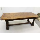 17th century-style brown oak refectory table, plank top with cleated ends raised on baluster turned