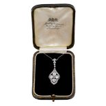 Edwardian diamond pendant with a quatrefoil cluster of four old cut diamonds