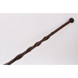 Late 19th / early 20th century carved hardwood tribal staff, possibly Zulu