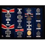 Extensive collection of fifty three Nazi orders and decorations, including War badges, German Cross,