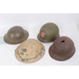 Group of various military helmets to include American M1917 steel helmet, French M26 steel helmet,