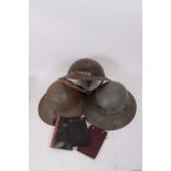 Second World War British Military MK II tin helmet, in black painted finish, marked D.C. Food