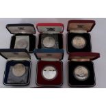 World - The Royal Mint issued mixed silver Crowns (x 10)