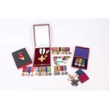Group of five various miniature medal groups, together with a silver league of mercy medal and