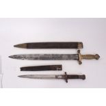 19th century short sword in scabbard and bayonet