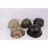 Group of various military helmets to include American M1 style helmet, Danish M39 helmet, Chinese