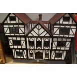Dolls House large Tudor style, unoccupied. Finished in white plaster with wooden beams.