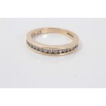 Gold (9ct) diamond half eternity ring with fifteen brilliant cut diamonds, estimated to weigh