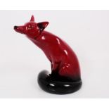 Royal Doulton Flambe model of a seated fox, Beswick model of a fox no.2438, together with another