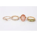 Gold (9ct) cameo ring, gold (9ct) diamond three stone ring, gold (9ct) eternity style ring and a