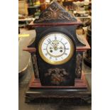 Large and impressive black slate mantel clock with skeleton dial