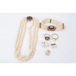 Cultured pearl three-strand necklace with gold, garnet and pearl clasp, matching bracelet, two